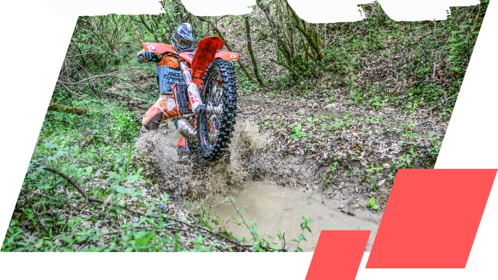 Enduro rider crossing water Enduro Touren in Kroatien Enduro Croazia