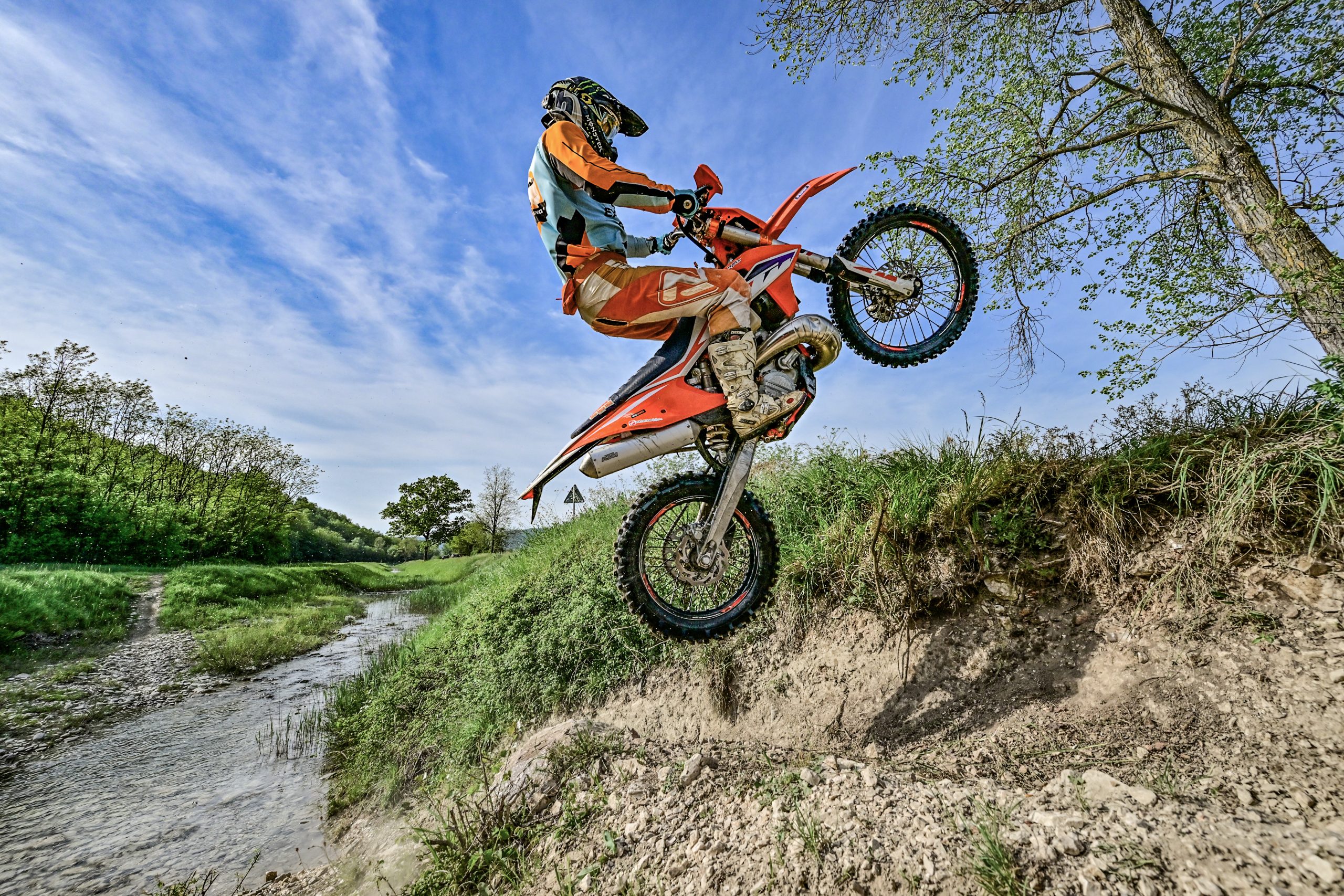 Hard enduro in Croatia, pilot climbing the hill