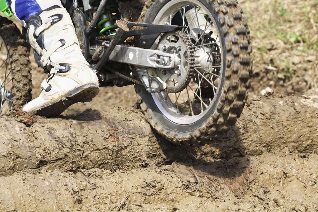 Motorbike climbing up hill salita enduro